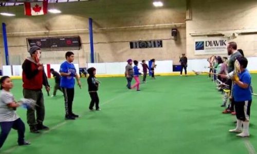 kids-playing-lacrosse-in-recreation-centre